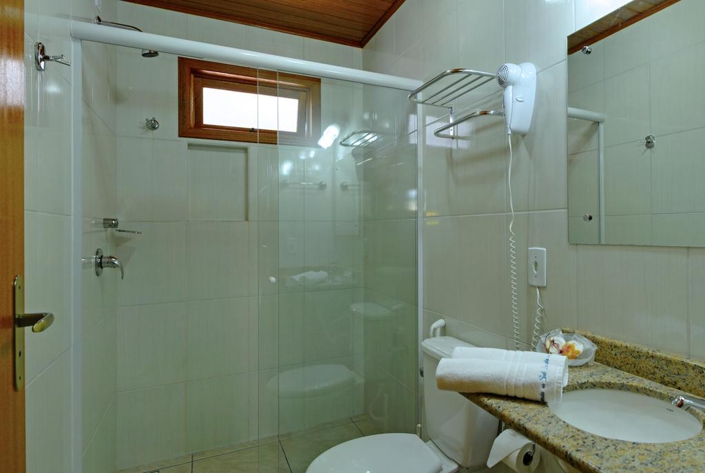 Morada Do Sol Apart Hotel Гаропаба Номер фото